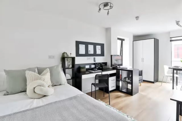 Bed desk chair shelves TV wardrobe living room bedroom at Maple House in Liverpool Student Accommodation