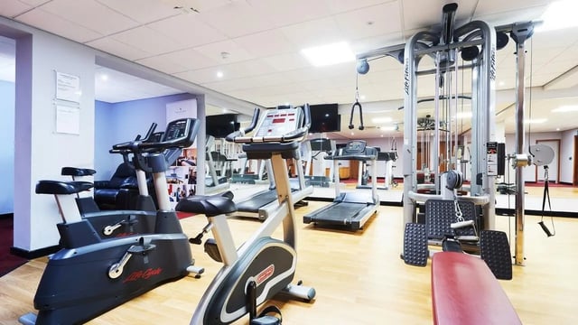 Gym equipment treadmills weight machine and bikes gym at Burges House in Coventry Student Accommodation
