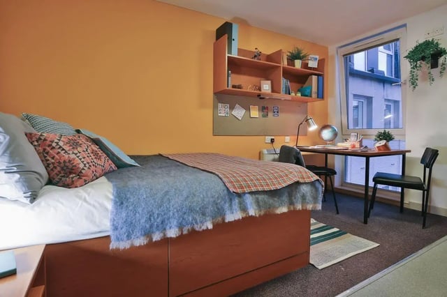 Bed desk shelf and window bedroom at 99 Penny Street in Lancaster Student Accommodation