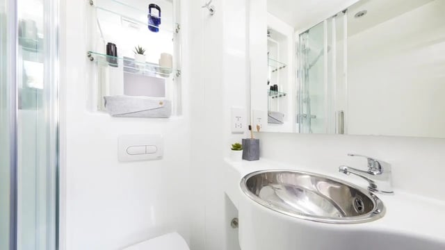 Sink toothbrush holder and mirror bathroom at Pillar Box in Coventry Student Accommodation