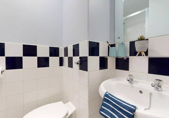 Toilet sink and shower in student bathroom. Bathroom at iQ Fiveways House in Wolverhampton Student Accommodation