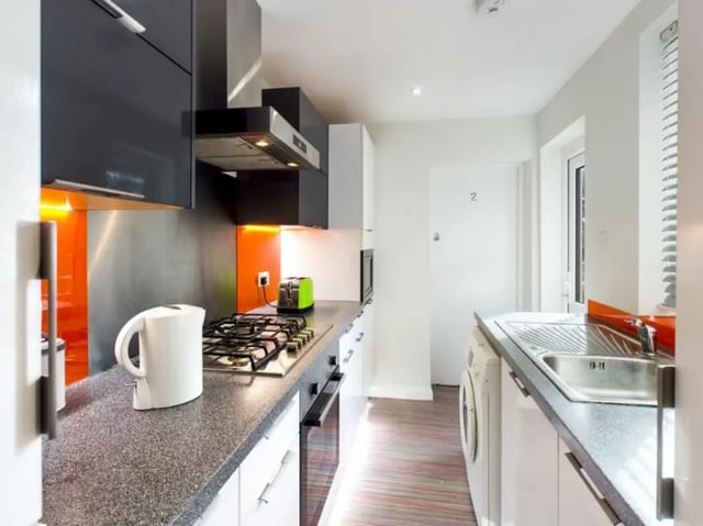 Kettle, toaster, hob, washing machine kitchen at 29 Guildford Street in Stoke-On-Trent Student Accommodation