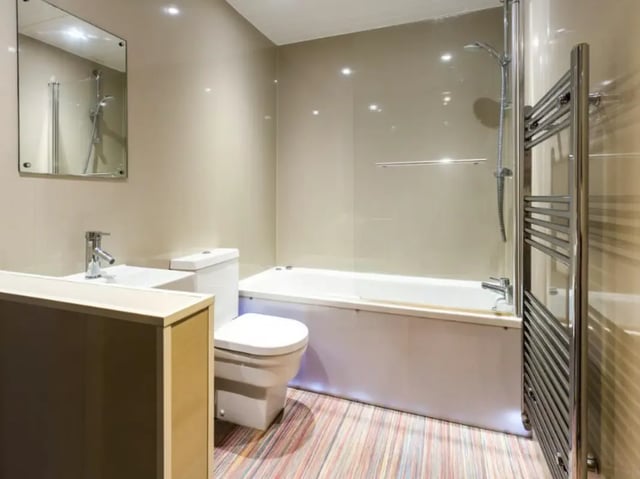 Sink toilet bathtub heated towel rail bathroom at 29 Guildford Street in Stoke-On-Trent Student Accommodation