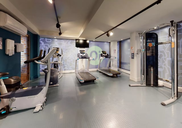 Treadmills and gym equipment gym area at iQ Magenta House in London Student Accommodation