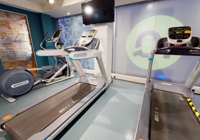 Treadmills and elliptical machine in gym gym at iQ Magenta House in London Student Accommodation