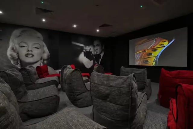 Beanbag chairs and movie wall art cinema room at Oldgate House in Huddersfield Student Accommodation