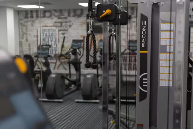 Gym equipment with ropes and weight stacks gym at Oldgate House in Huddersfield Student Accommodation