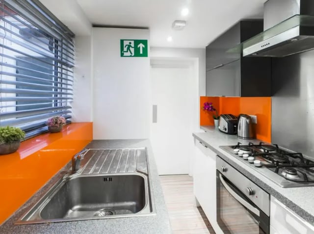 Sink toaster kettle stove cabinets kitchen at 210 Cauldon Road in Stoke-On-Trent Student Accommodation