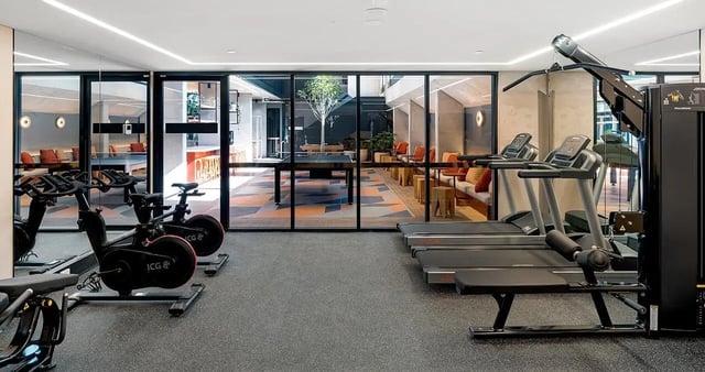 Treadmills exercise bikes and weight machine gym at Iglu Summer Hill in Sydney Student Accommodation