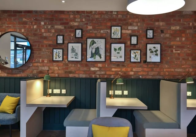 Study nooks with lamps and artwork Living room at iQ Penworks House in Birmingham Student Accommodation