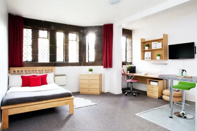 Bed desk chair television and breakfast bar studio apartment at The Priory in Leeds Student Accommodation