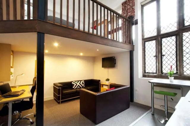 Loft bed sofas desk television living room at The Priory in Leeds Student Accommodation