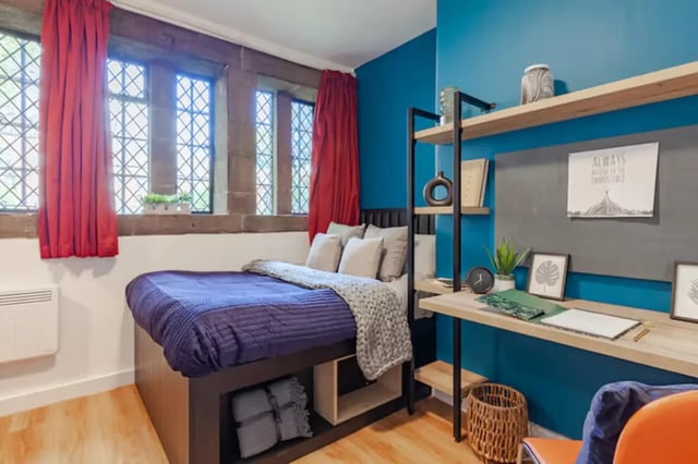 Bed study desk shelves plants picture bedroom at The Priory in Leeds Student Accommodation
