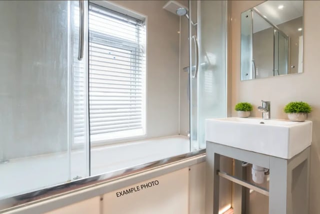 Sink shower bathtub and mirror bathroom at 17 Carlton Road in Stoke-On-Trent Student Accommodation