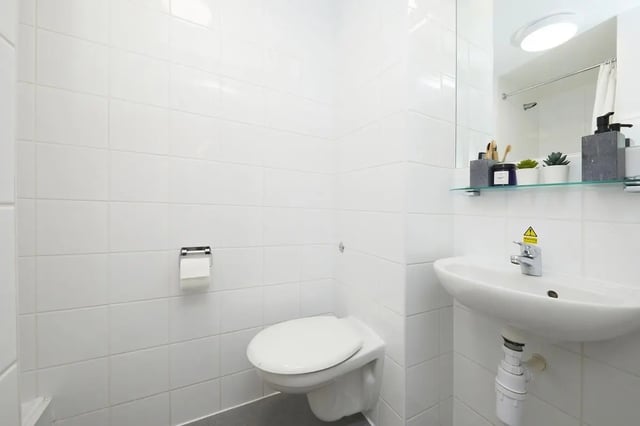 Toilet sink and toilet paper holder bathroom at Point Exe Exeter in Exeter Student Accommodation