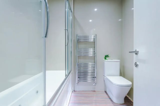Modern white toilet towel rack glass shower bathroom at 9 Queen Anne Street in Stoke-On-Trent Student Accommodation