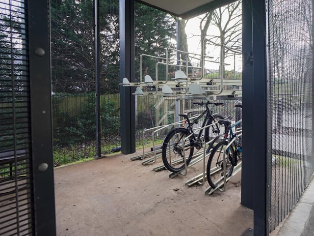 Bicycles on multi level rack exterior at 800 Bristol Road in Birmingham Student Accommodation