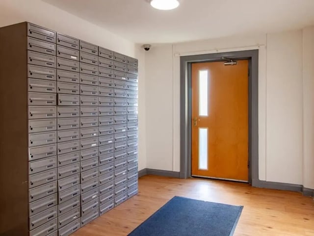Mailboxes and orange door entry area at The Print House in Loughborough Student Accommodation