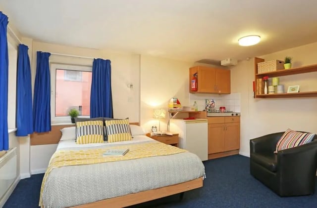 Bed kitchen and chair studio apartment at The Print House in Loughborough Student Accommodation
