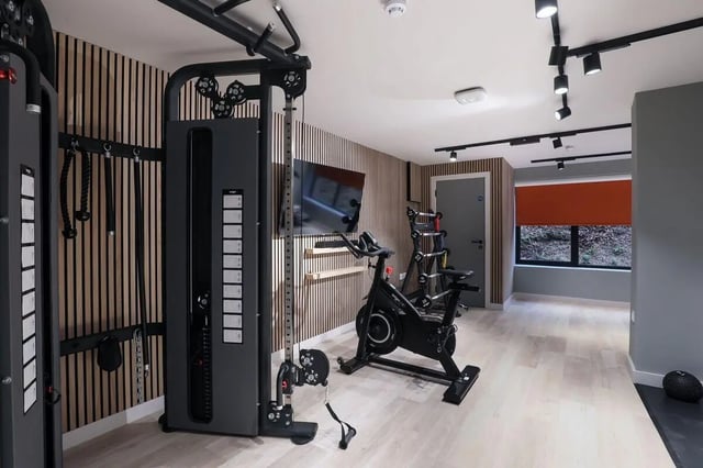 Gym with cable machine exercise bike and weights gym at St Mark's Court in Leeds Student Accommodation