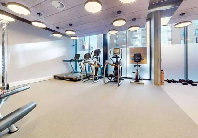Treadmills ellipticals stationary bike gym area at iQ Aldgate in London Student Accommodation