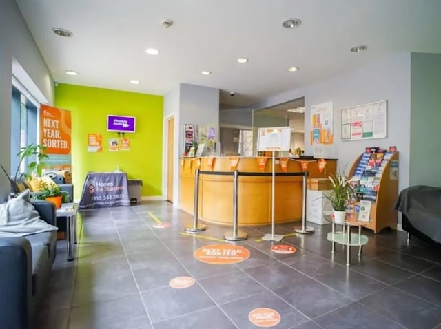Reception desk with social distancing floor markers lobby at Beaverbank Place in Edinburgh Student Accommodation