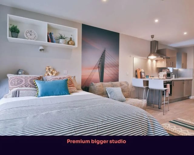 Bed kitchen bar counter studio apartment at Victoria Point in Manchester Student Accommodation