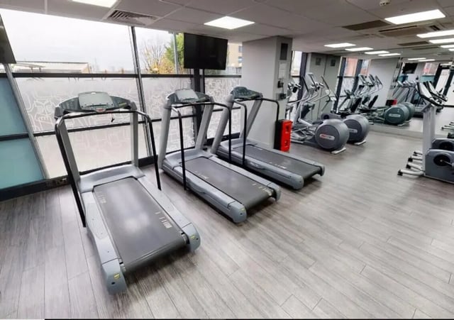 Treadmills elliptical machines gym interior at iQ Marsden House in Leeds Student Accommodation