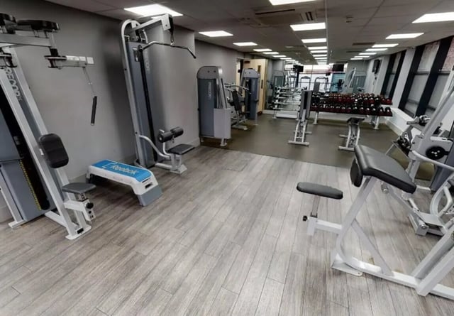 Weight machines Reebok step gym equipment fitness area at iQ Marsden House in Leeds Student Accommodation