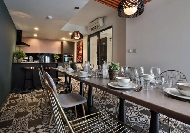 Dining table set with chairs kitchen area at iQ Hammersmith in London Student Accommodation