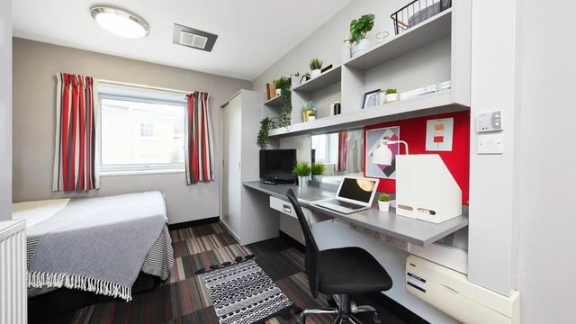 Bed desk laptop chair and shelves bedroom at Clarendon Street in Nottingham Student Accommodation