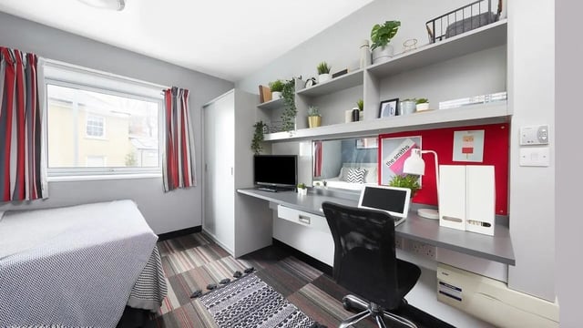 Bed desk chair window storage and shelves bedroom at Clarendon Street in Nottingham Student Accommodation