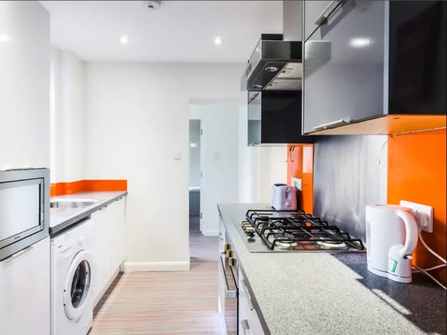 Modern student kitchen with washing machine and kettle kitchen at 41 Seaford Street in Stoke-On-Trent Student Accommodation