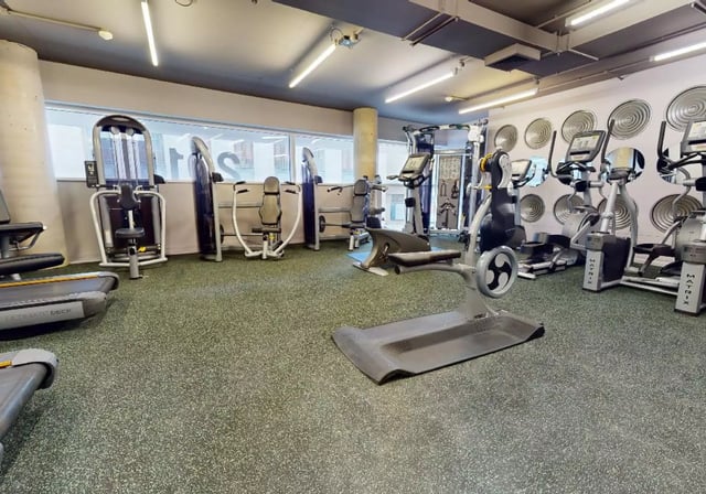 Gym equipment with treadmills and exercise machines Gym at iQ Highbury in London Student Accommodation