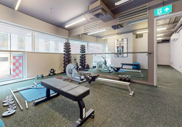 Dumbbells rowing machines bench weights gym area at iQ Highbury in London Student Accommodation