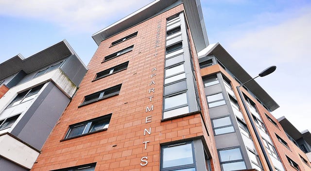 Brick building with multiple windows exterior at Marketgait Apartments in Dundee Student Accommodation