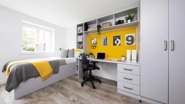 Bed desk chair shelves and wardrobe bedroom at Collegiate Cathedral Point in Winchester Student Accommodation
