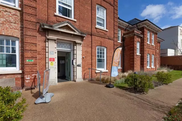 Entrance with sign and brick building exterior exterior at Atlas House in Exeter Student Accommodation