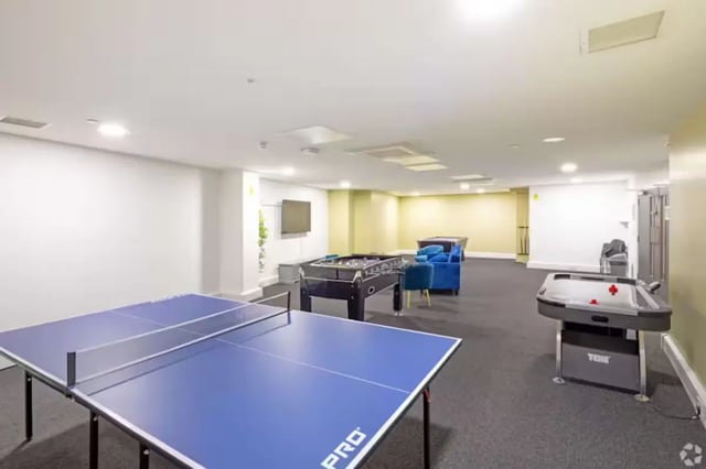 Ping pong table foosball and air hockey table living room at The Paper Works in Sheffield Student Accommodation