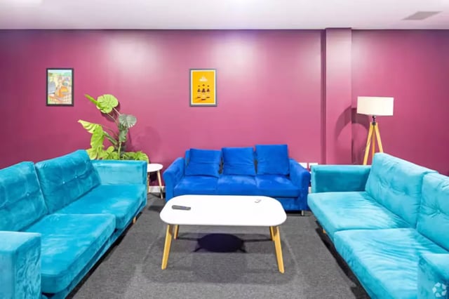 Velvet couches and tables living room at The Paper Works in Sheffield Student Accommodation