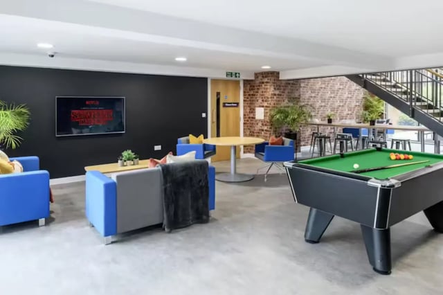 Pool table and lounge seating common area at The Elements in Sheffield Student Accommodation