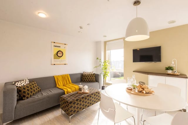 Sofa coffee table and dining table living room at Merlin Point in Coventry Student Accommodation