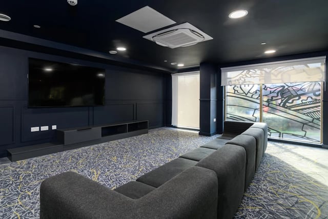 Large television modular sofa patterned carpet living room at Stanley Studios in Southampton Student Accommodation