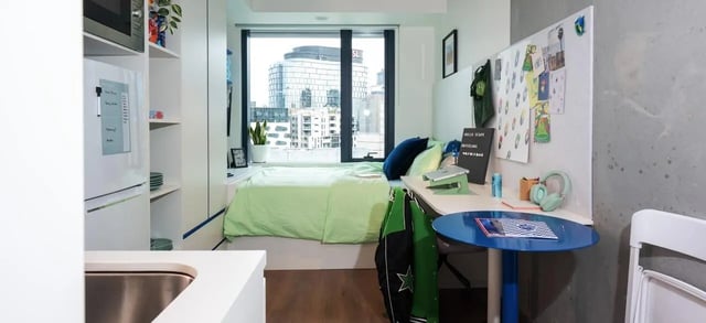 Bed desk and microwave student room at Scape Leicester in Melbourne Student Accommodation