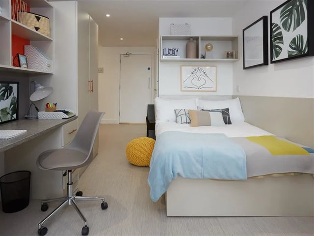 Desk chair bed and shelves bedroom at The Lantern in Liverpool Student Accommodation