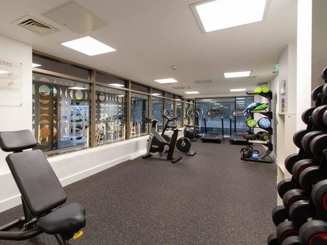 Dumbbells exercise bikes treadmills weight rack gym at The Lantern in Liverpool Student Accommodation