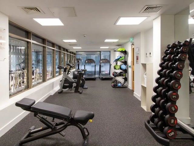 Dumbbells treadmills stationary bikes gym. at The Lantern in Liverpool Student Accommodation