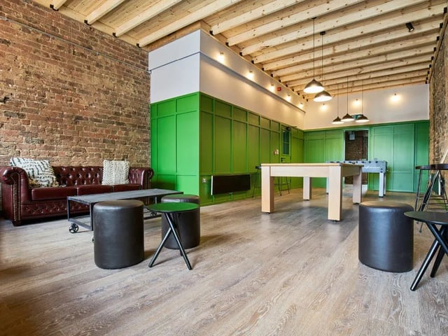 Sofa pool table foosball table living area at The Lantern in Liverpool Student Accommodation