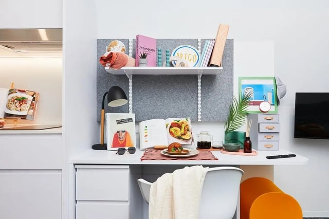 Desk with books lamp and cooking study area at Scape Darlington in Sydney Student Accommodation