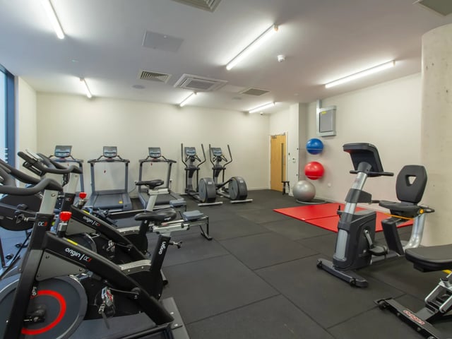 Gym equipment and exercise balls fitness area at The Barn in Exeter Student Accommodation